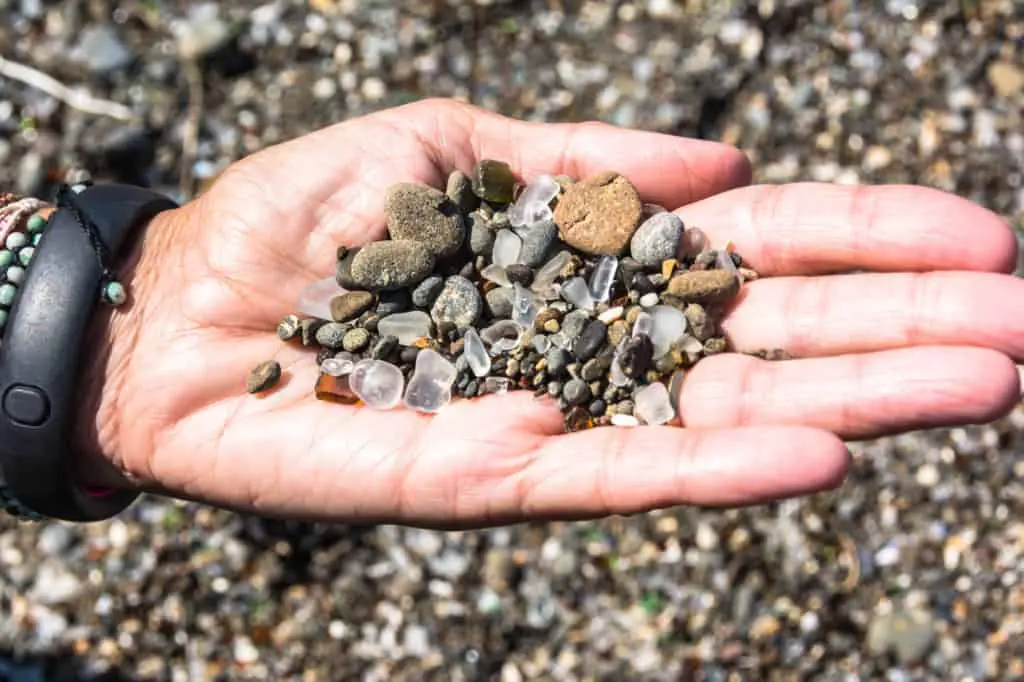 Sea glass in the hand California View - California Places, Travel, and News.