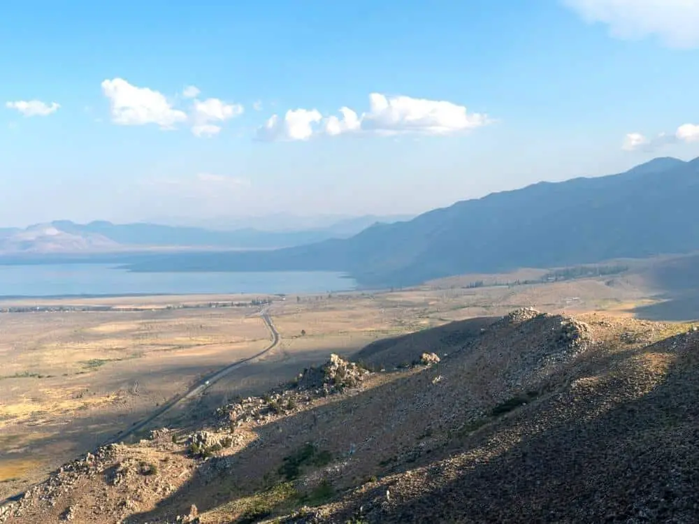 The San Luis Reservoir during dry and hot season artificial lake on San Luis Creek in the eastern slopes of the Diablo Range of Merced County California. - California Places, Travel, and News.