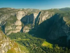 Scenic view of mountains and forest in Yosemite National Park viewed from Glacier Point California U.S.A. - California Places, Travel, and News.