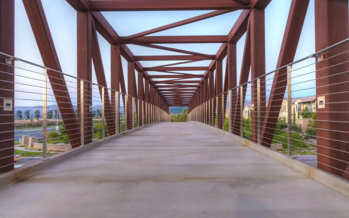 Footbridge over Irvine California in the evening close to sunset in summer. - California Places, Travel, and News.