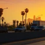 La Los Angeles Sunset Skyline With Traffic California From Freeway. - California View