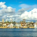 View of Balboa Island and buildings in Irvine from Newport Bea. - California Places, Travel, and News.