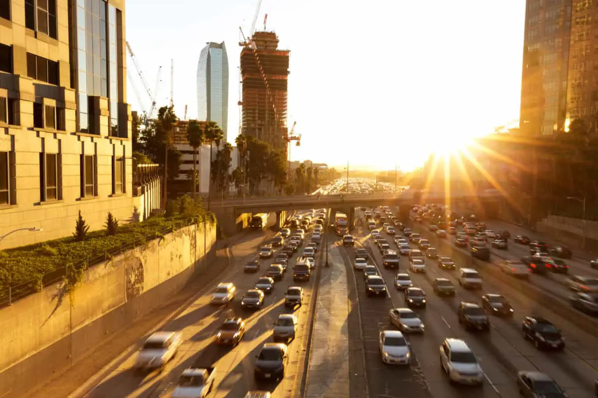 Busy traffic on road in downtown of Los Angeles - California Places, Travel, and News.