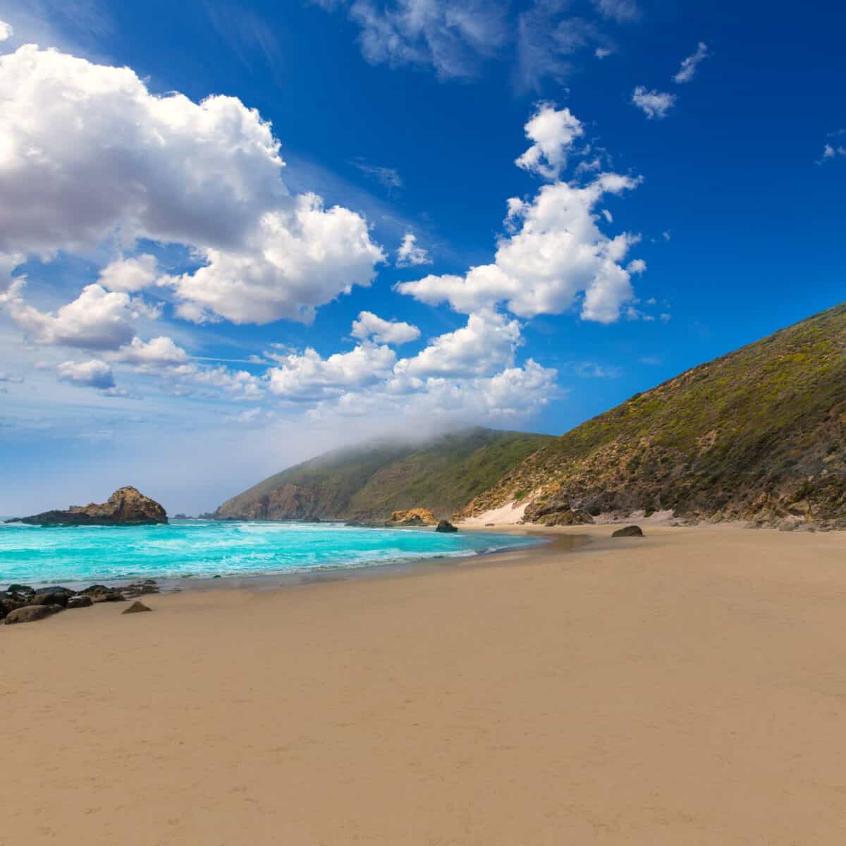 California Pfeiffer Beach in Big Sur State Park rocks and waves. - California Places, Travel, and News.