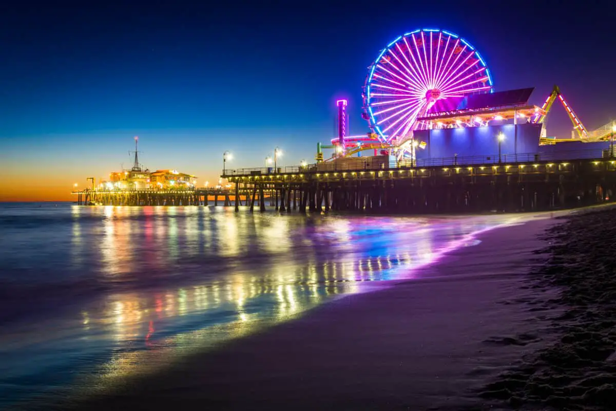 The Santa Monica Pier at night in Santa Monica California - California Places, Travel, and News.