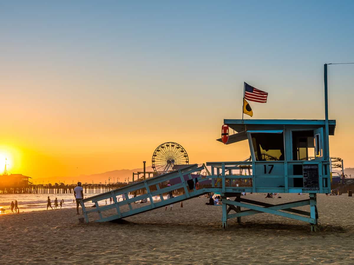 santa monica lifeguard tower and pacific park at background. - California Places, Travel, and News.