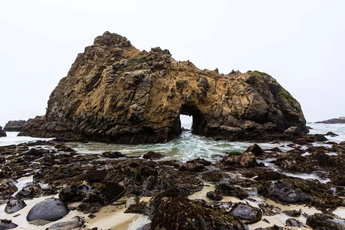 California Pfeiffer Beach in Big Sur State Park rocks and waves. 2 - California Places, Travel, and News.