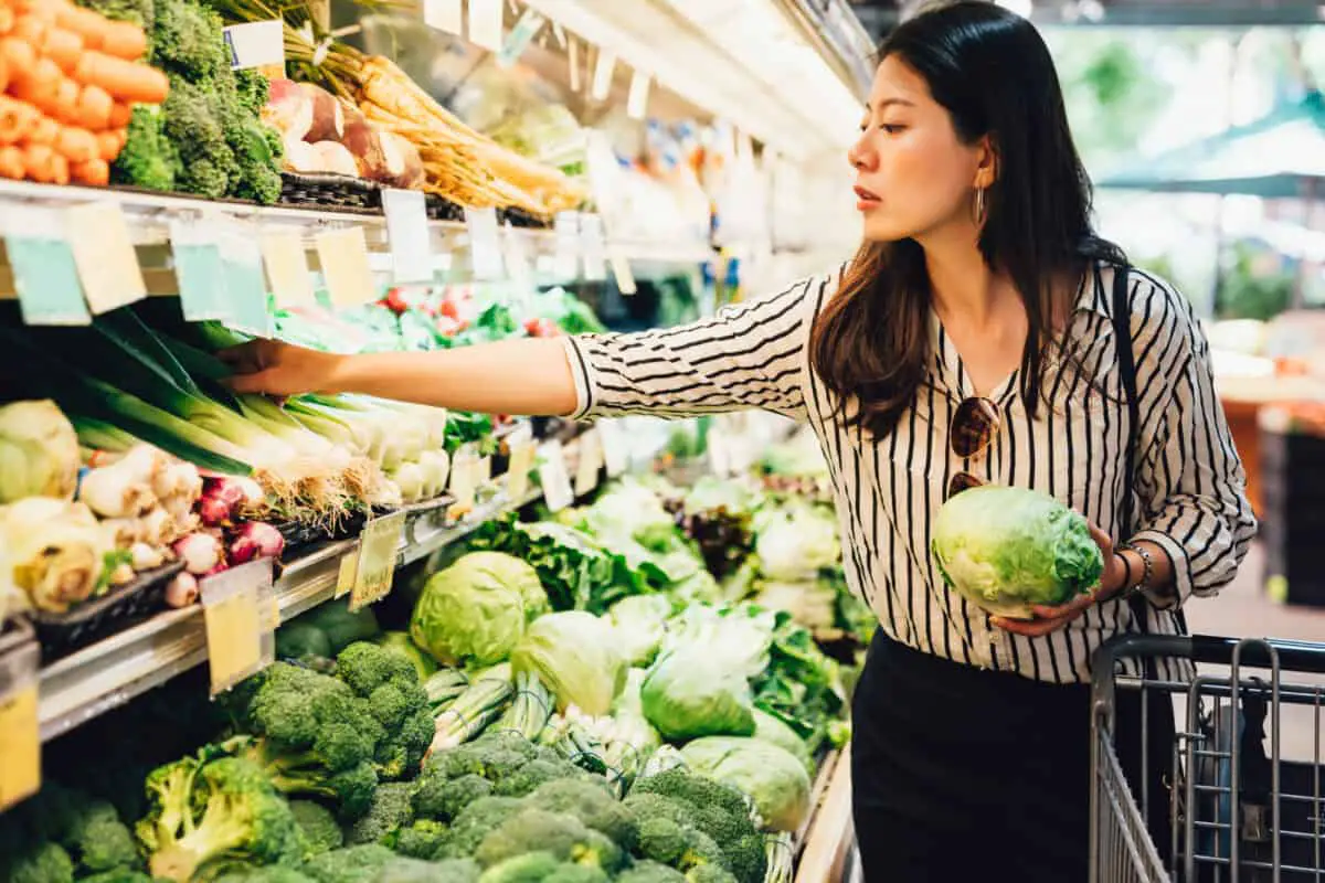 Local California woman buy vegetables and fruits in supermarket - California Places, Travel, and News.