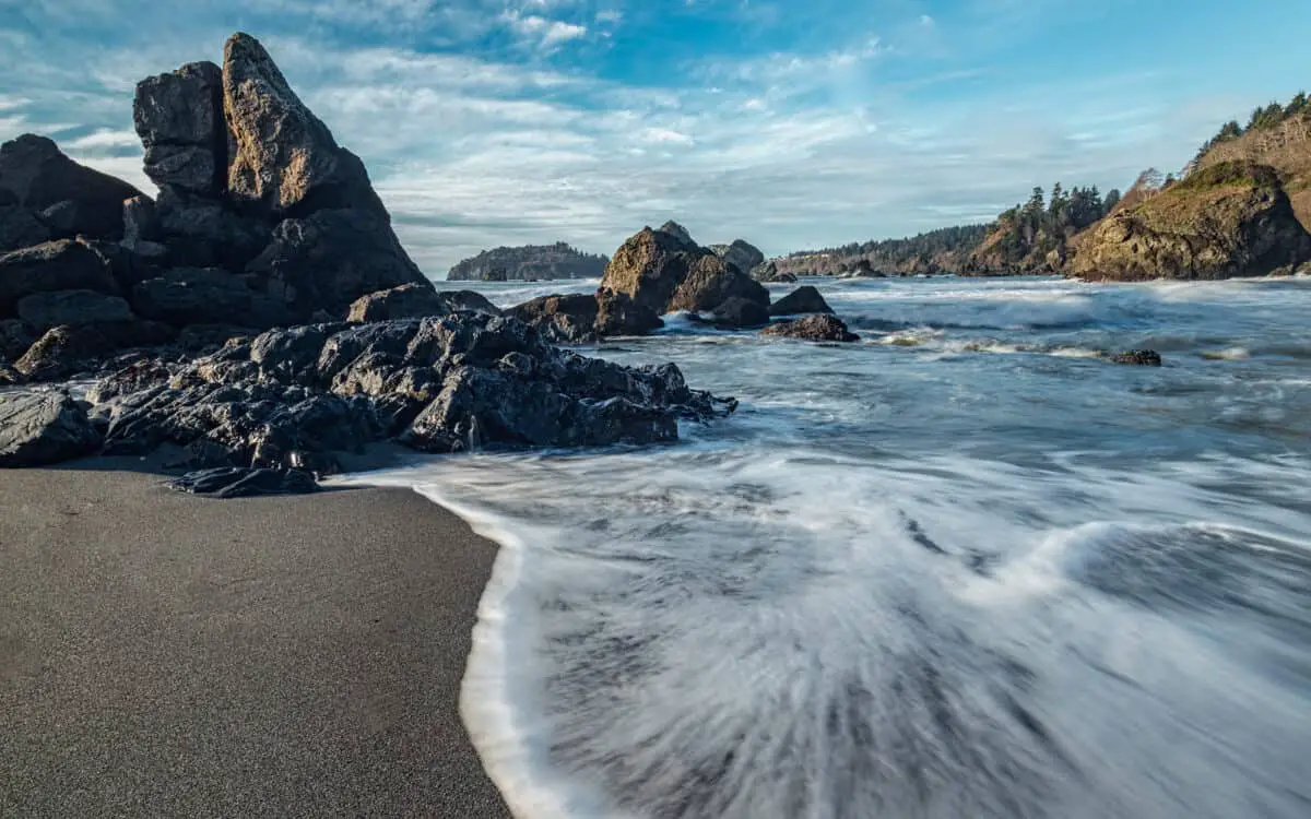 Long exposure color image of the Pacific coastline at Sunset. - California Places, Travel, and News.