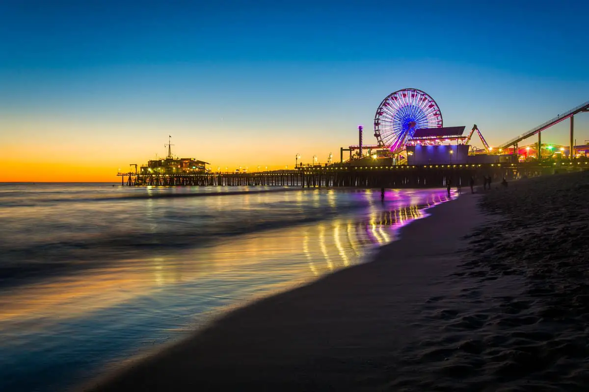 The Santa Monica Pier at sunset in Santa Monica California - California Places, Travel, and News.