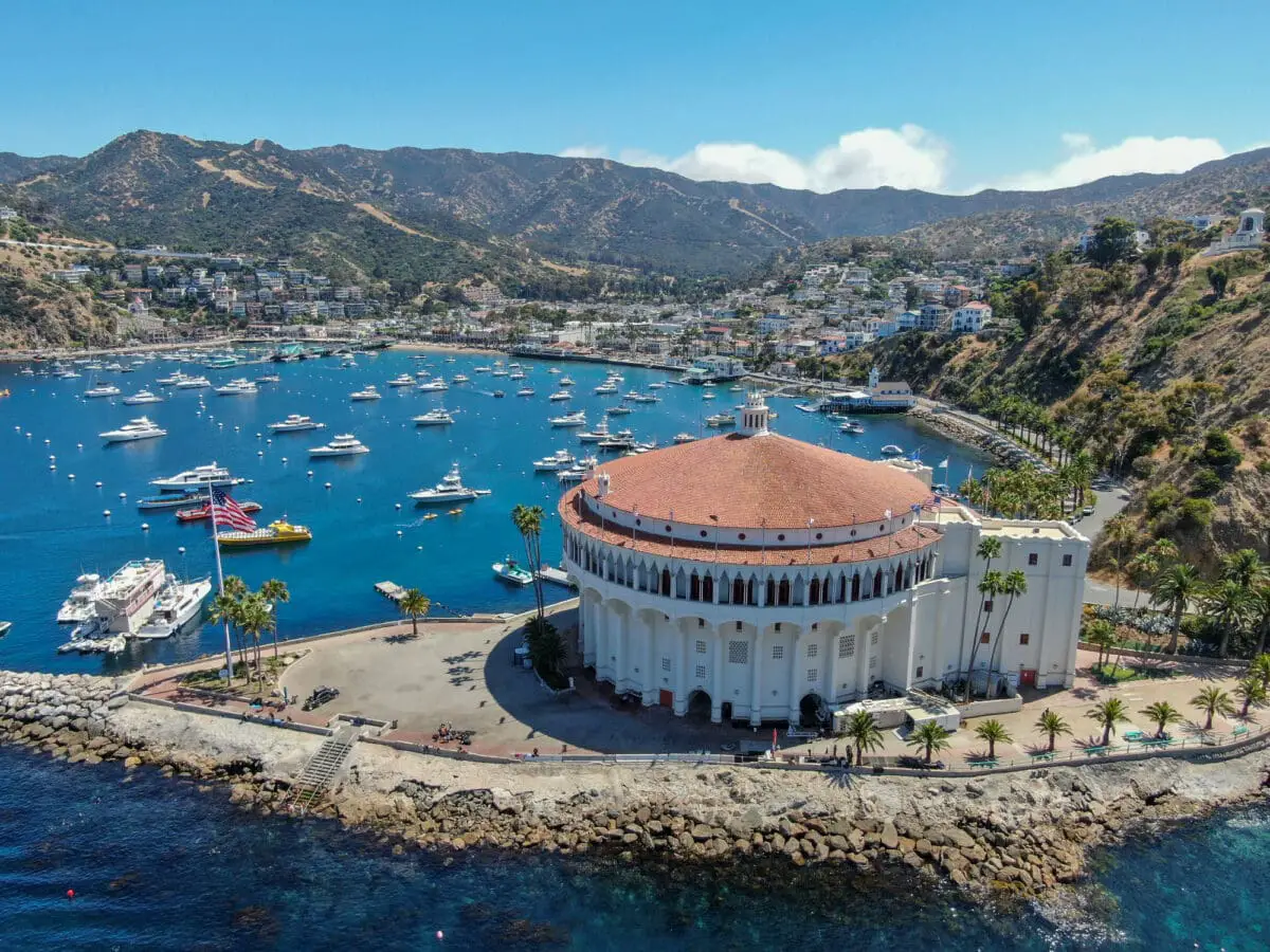 Aerial view of Catalina Casino and Avalon harbor with sailboats - California Places, Travel, and News.