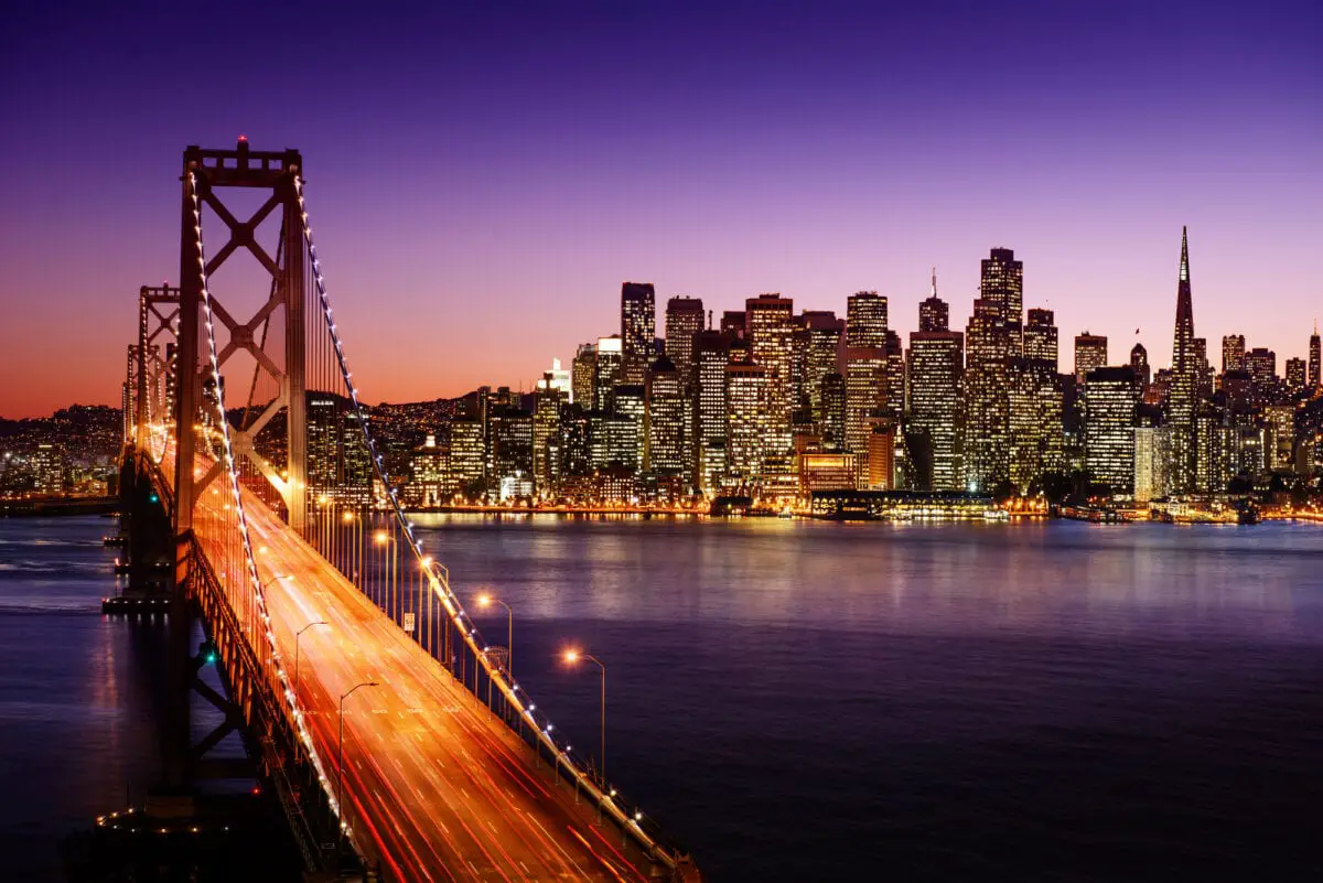 San Francisco skyline and Bay Bridge at sunset California - California Places, Travel, and News.