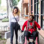 Disabled Woman and her Friend Shopping - California Places, Travel, and News.