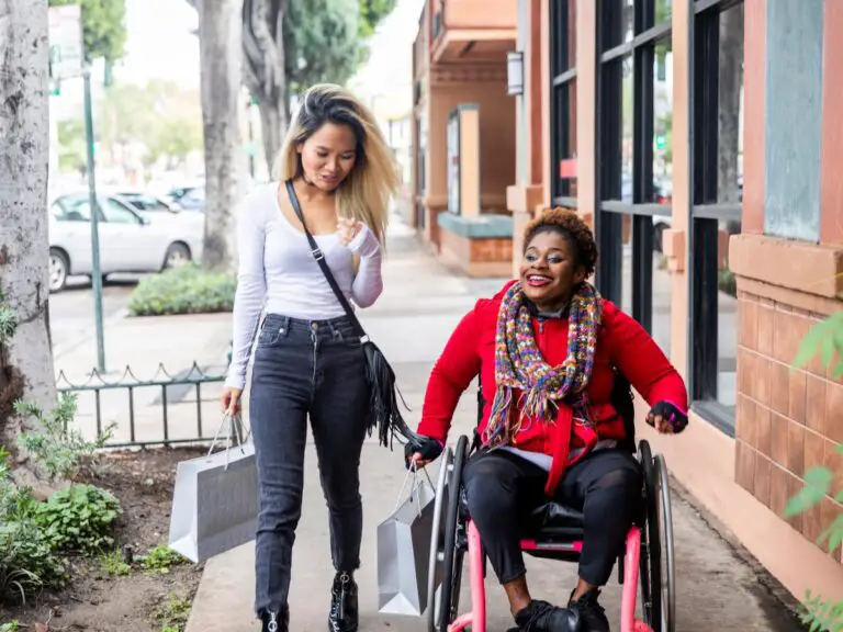 Disabled Woman And Her Friend Shopping 768x576 