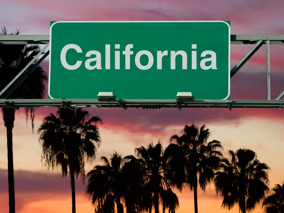 California road sign at sunset - California Places, Travel, and News.