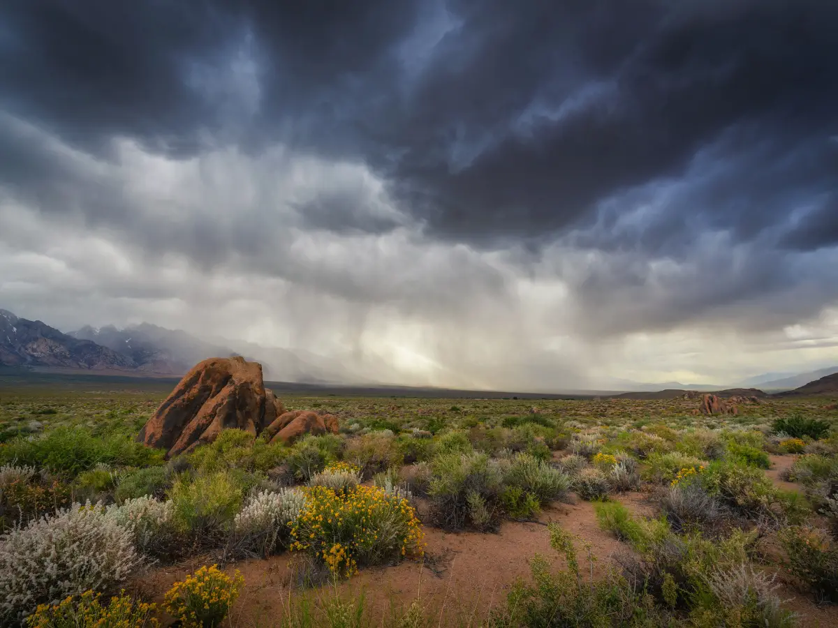 Dark rain clouds over Alabama Hills in California - California Places, Travel, and News.