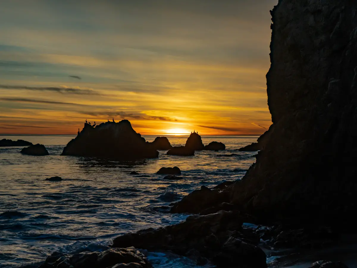 Golden sunset over El Matador State Beach in Malibu California - California Places, Travel, and News.