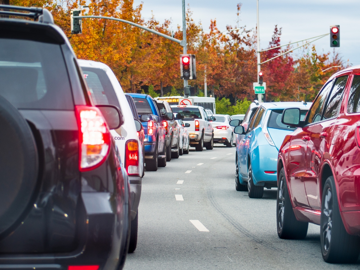 Heavy afternoon traffic in Mountain View Silicon Valley California cars stopped at a traffic light - California Places, Travel, and News.