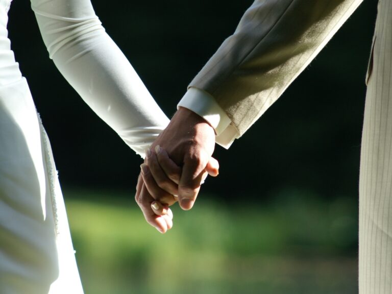 Married couple hands - California Places, Travel, and News.
