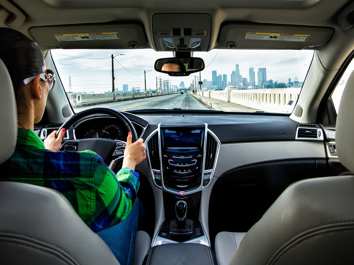 Woman drivingg in California - California Places, Travel, and News.